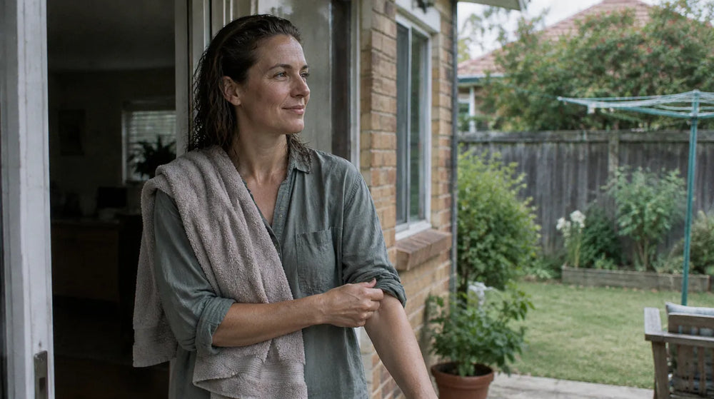 Australian woman at her back door after a shower, skin comfortable not tight - coconut oil soap benefits