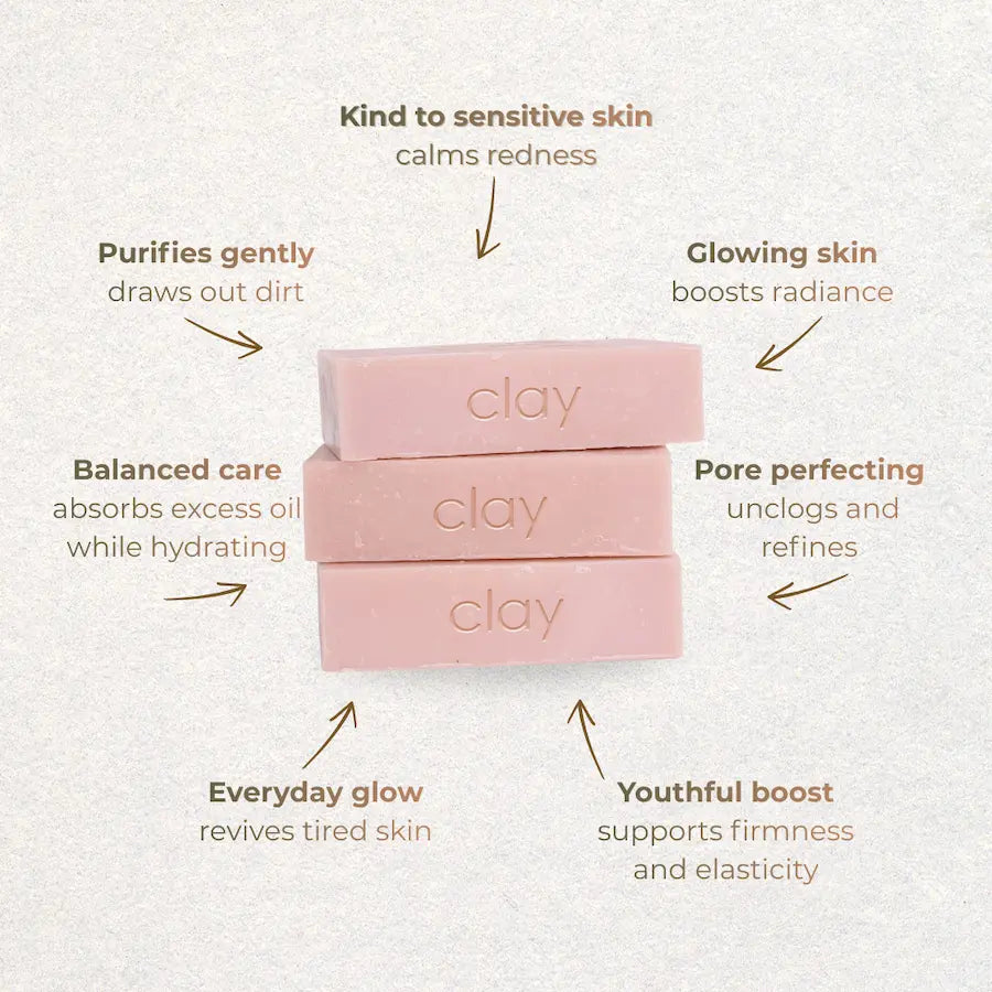 Three pink clay bars with text describing their benefits on a light gray background