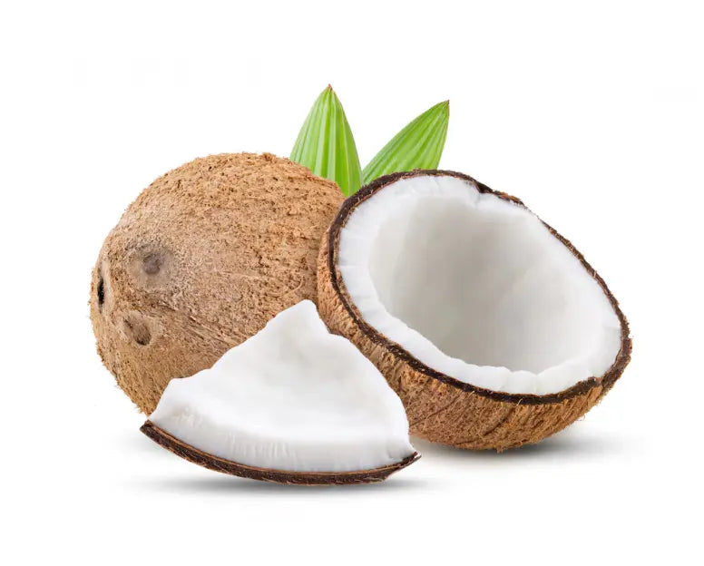 Coconut with a split open showing white flesh on a white background